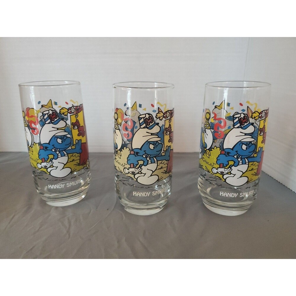 3 Vtg Handy Smurf Tumblers Glasses Licensed Peyo Wallace Berrie & Co 1983